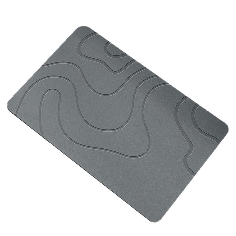 Neat Theory grey diatomaceous stone bath mat on white background