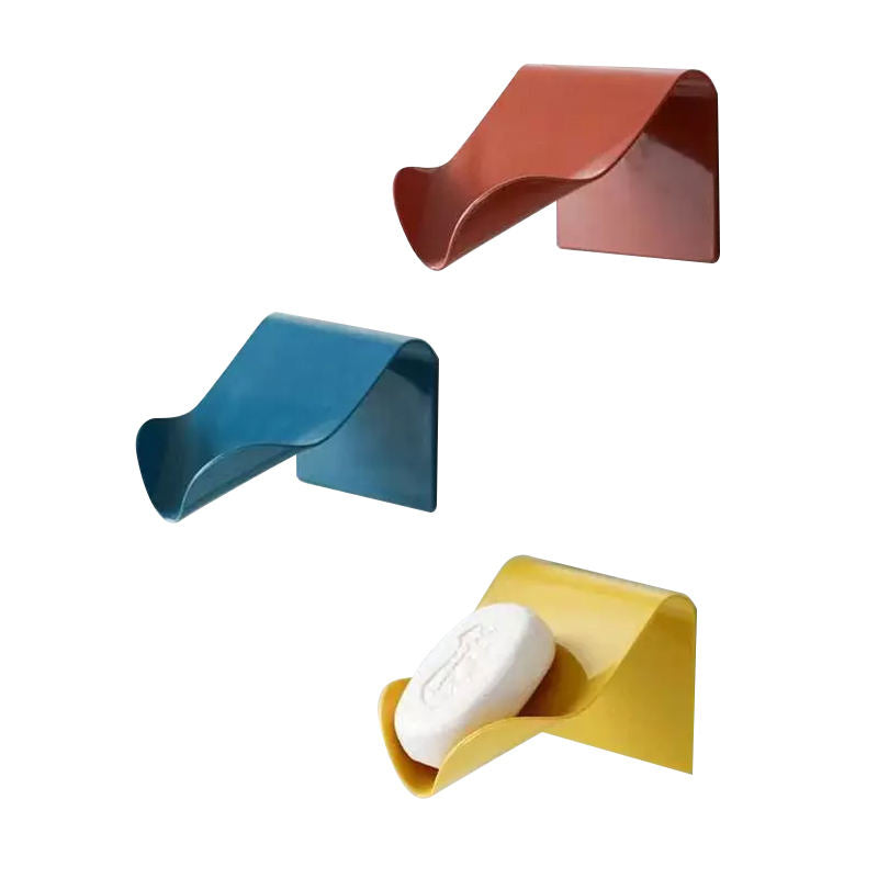 Neat Theory red blue and yellow soap holders on white background