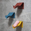 Neat Theory self-draining wall soap holders in a bathroom