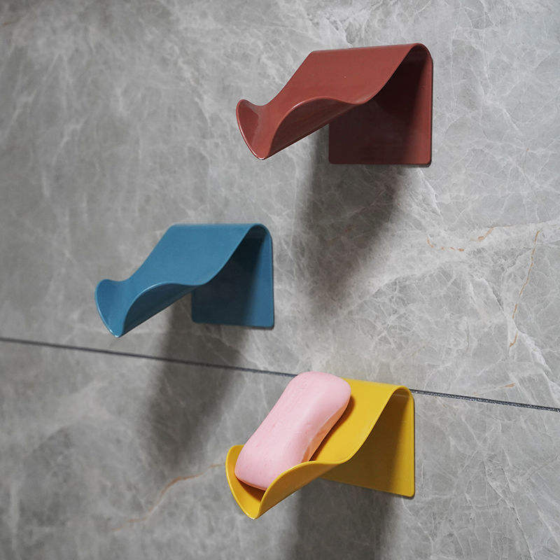 Neat Theory self-draining wall soap holders in a bathroom