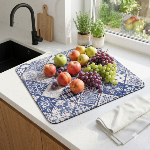 Neat Theory patterned dish drying mat beside a kitchen sink